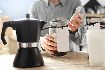 Image showing Barista prepares coffee Pressure coffee percolator coffee makers Teapot coffee