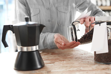 Image showing Barista prepares coffee Pressure coffee percolator coffee makers Teapot coffee