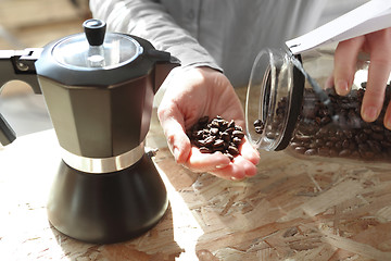 Image showing Barista prepares coffee Pressure coffee percolator coffee makers Teapot coffee