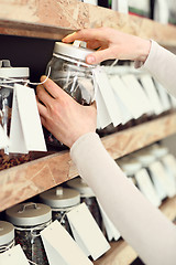 Image showing Coffee on the scale, coffee shop A woman buys a cup of coffee in the coffee shop