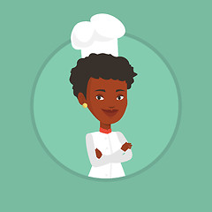 Image showing Confident female chef with arms crossed.