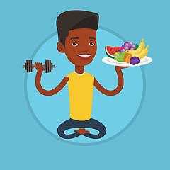 Image showing Healthy man with fruits and dumbbell.