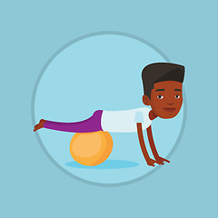 Image showing Young man exercising with fitball.