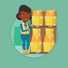 Image showing Warehouse worker scanning barcode on box.