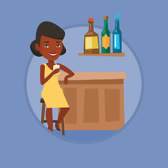 Image showing Woman sitting at the bar counter.