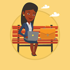 Image showing Business woman working on laptop outdoor.