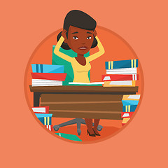 Image showing Student sitting at the table with piles of books.