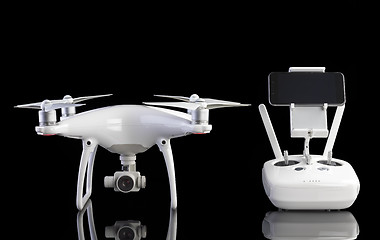 Image showing White drone against black background.