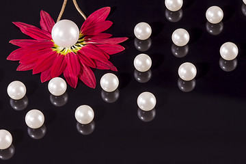 Image showing White pearls necklace on black background