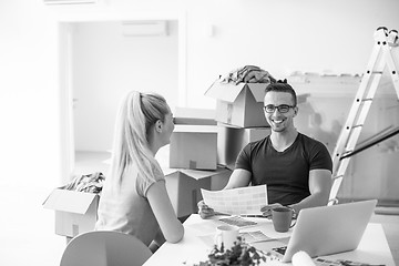 Image showing Young couple moving in a new home