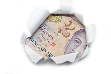 Image showing Singapore currency peeking through white paper