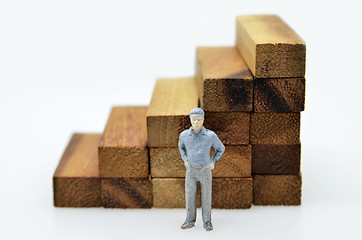 Image showing Way to success with  businessman and wood block step