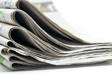 Image showing Newspapers folded and stacked