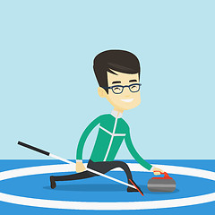 Image showing Curling player playing curling on curling rink.