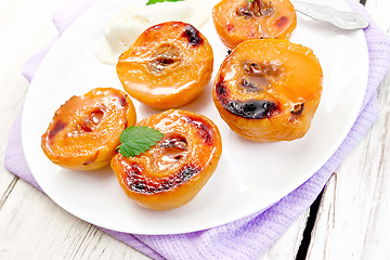 Image showing Quince baked in plate on light board