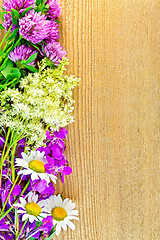 Image showing Frame of wildflowers on board