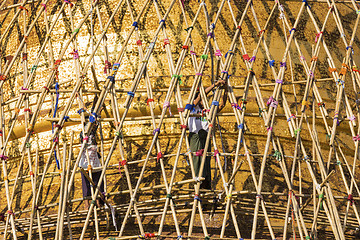 Image showing Worker repareing golden temple