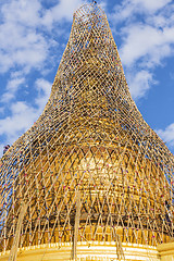 Image showing Worker repareing golden temple