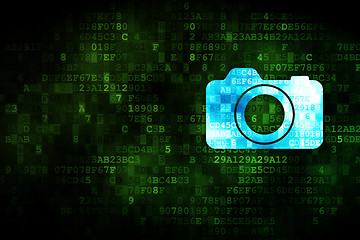 Image showing Travel concept: Photo Camera on digital background