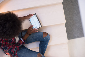 Image showing black woman using her electronic tablet