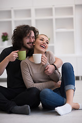 Image showing young couple in their new home