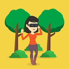Image showing Woman wearing virtual reality headset in the park.