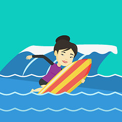 Image showing Happy surfer in action on a surf board.