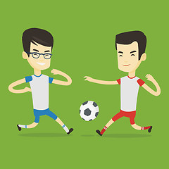 Image showing Two male soccer players fighting for ball.