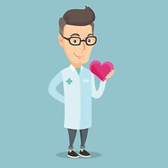 Image showing Doctor cardiologist holding heart.