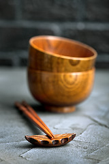 Image showing wood bowl with wooden chopsticks