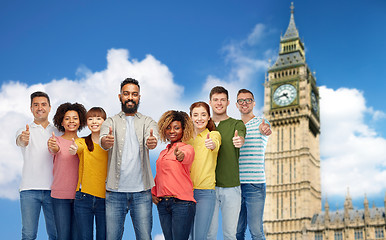 Image showing group of people showing thumbs up over big ben 