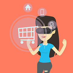 Image showing Woman in virtual reality headset shopping online.