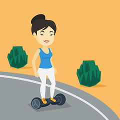Image showing Woman riding on self-balancing electric scooter.
