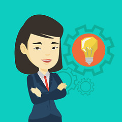 Image showing Woman with business idea bulb in gear.