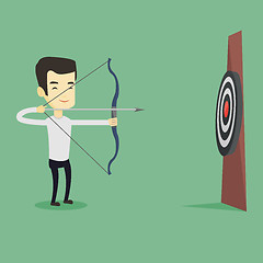 Image showing Archer aiming with bow and arrow at the target.