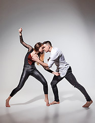 Image showing Two people dancing in contemporary stile