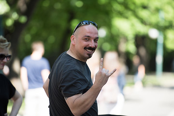 Image showing man showing a rock hand gesture