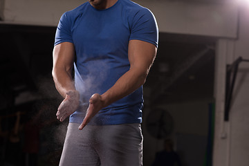 Image showing Gym Chalk Magnesium Carbonate hands clapping man