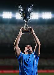 Image showing soccer players celebrating victory