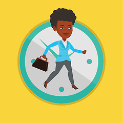 Image showing Business woman running on clock background.