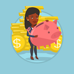 Image showing Business woman holding big piggy bank.