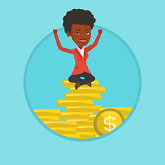 Image showing Happy business woman sitting on golden coins.