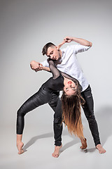 Image showing Two people dancing in contemporary stile