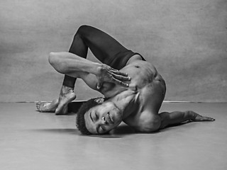 Image showing The male ballet dancer posing over gray background