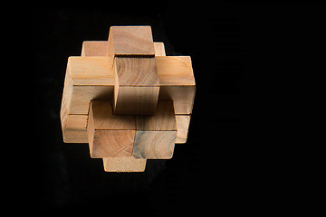 Image showing The wooden puzzle - game with blocks