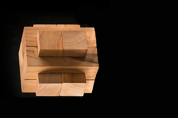 Image showing The wooden puzzle - game with blocks