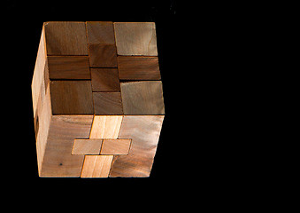 Image showing The wooden puzzle - game with blocks