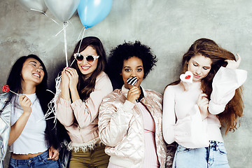 Image showing Lifestyle and people concept: young pretty diversity nations woman with different age children celebrating on birth day party together happy smiling, making selfie. African-american, asian and caucasi