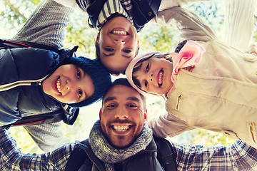 Image showing happy family faces outdoors at camp in woods