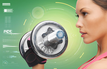 Image showing close up of sporty woman with dumbbell